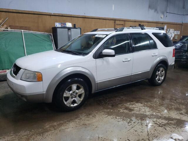 5F9Z7431004AAA 2005-2007 Ford Freestyle Passenger RH Interior Quarter Panel Trim Panel Used OEM