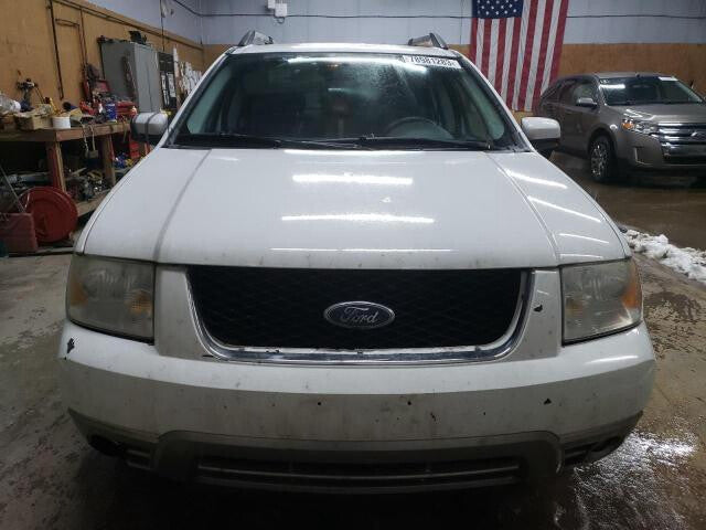 5F9Z7431004AAA 2005-2007 Ford Freestyle Passenger RH Interior Quarter Panel Trim Panel Used OEM