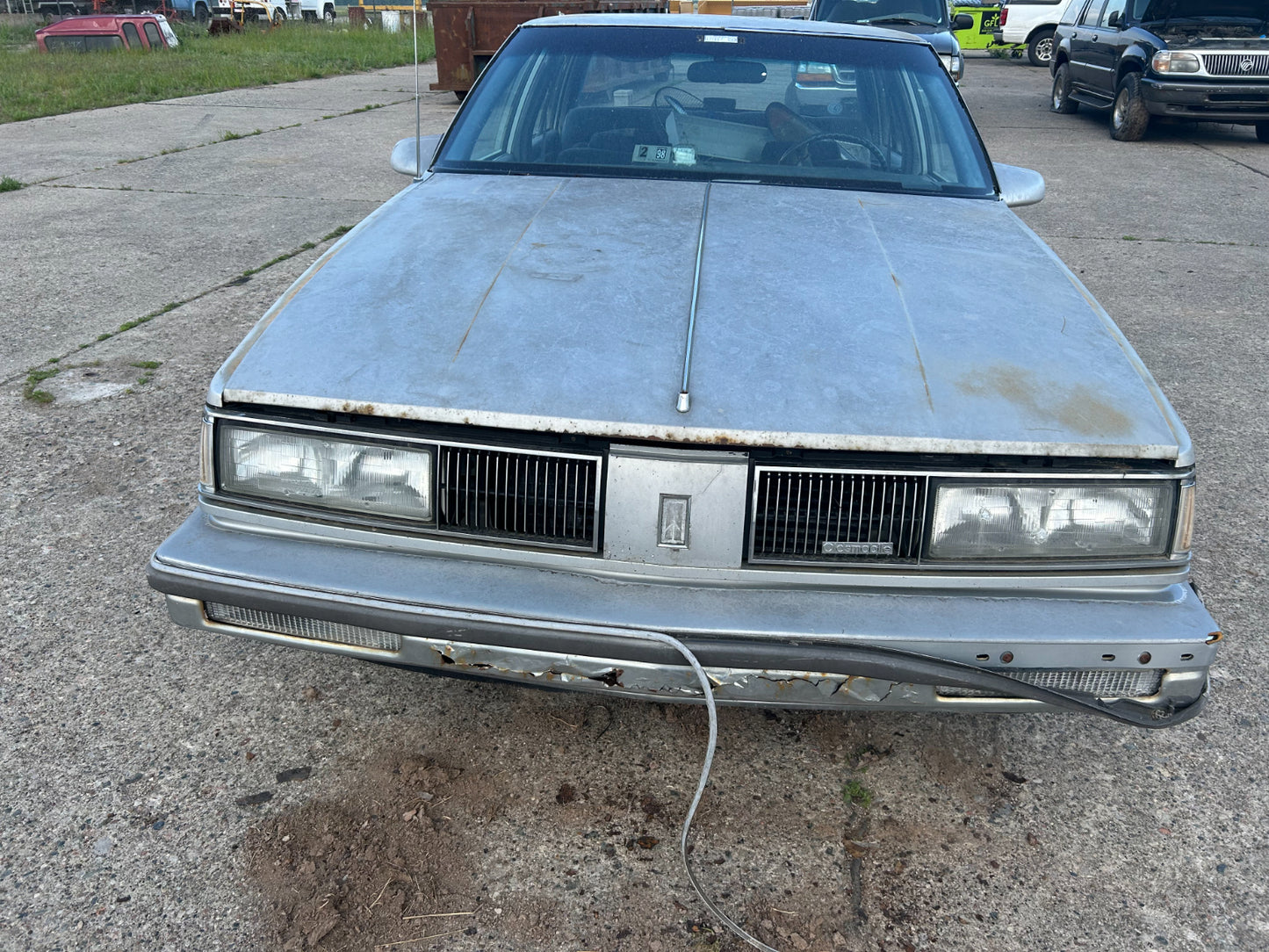 25559843 1986-1987 Oldsmobile Delta 88 Instrument Cluster Bezel Used 25559843 OEM