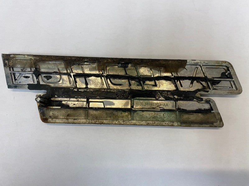 XL14-16703-AA 1999-2002 Ford Expedition Left Fender Emblem YL1Z16720AA 9in long