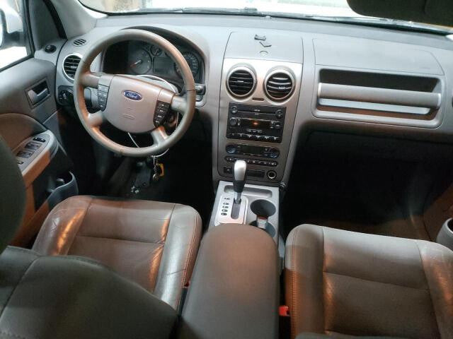 5F9Z7422600AA 2005-2007 Ford Freestyle Driver FL Interior Door Handle Used OEM 5F9Z7422601AA