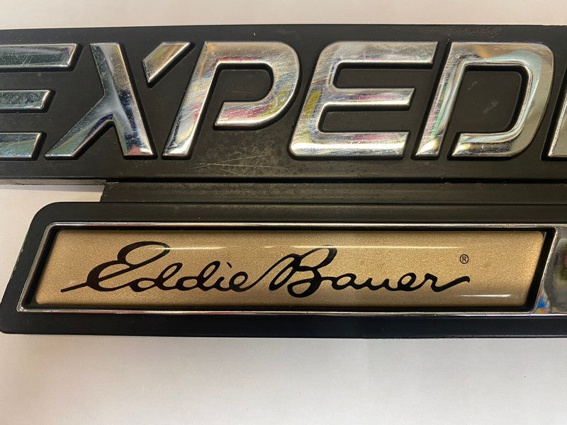 XL14-16703-AA 1999-2002 Ford Expedition Left Fender Emblem YL1Z16720AA 9in long