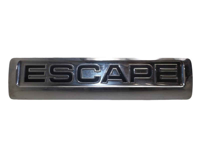 8L847843156CA 2008-2012 Ford Escape Rear Trunk Deck Lid Emblem Used OEM 8L847843156CA