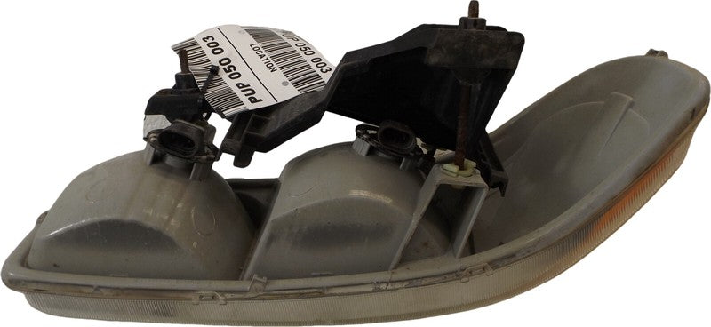 15218077 1999-2006 GMC Sierra 1500 Passenger FR Headlight Used OEM 16524542