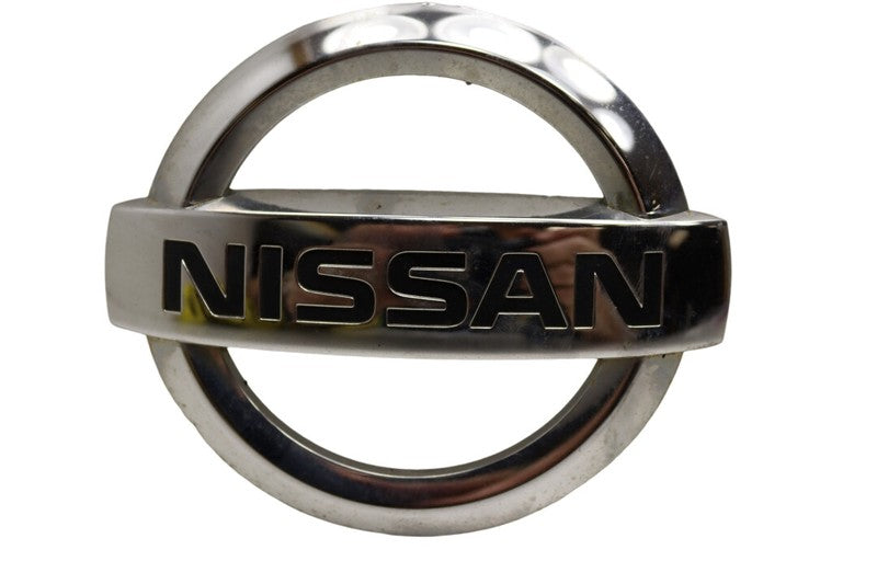84890JM00A 2008-2015 Nissan Rogue Hatch Emblem Used OEM 84890JM00A