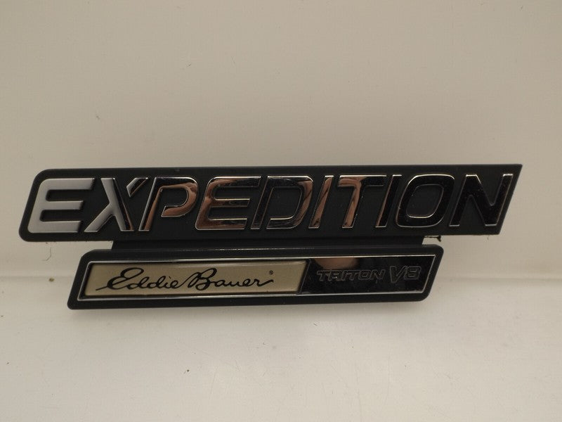 YL1Z16720AA 1999-2002 Ford Expedition Fender Emblem YL1Z16720AA / XL14-16702-AA
