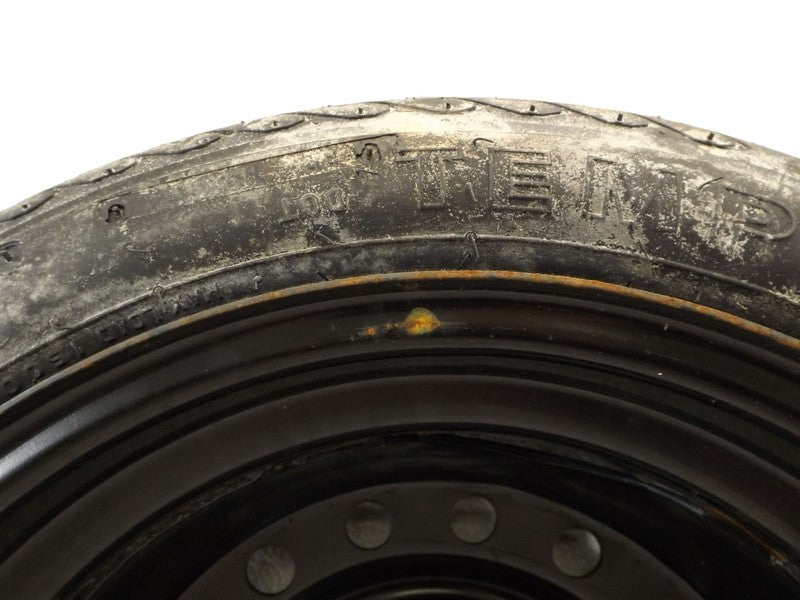 563-000 1986-1988 Oldsmobile 98 Spare Tire T125/70D15 Used 563-000 OEM
