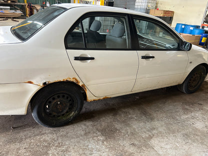 MR506452 2002-2007 Mitsubishi Lancer Instrument Cluster Bezel Used MR506452 OEM